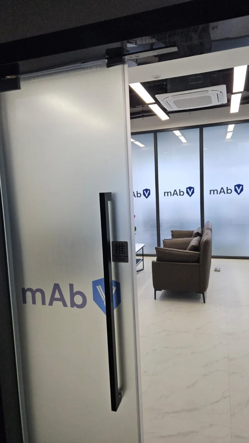 mAbV logo and entity signage in the office